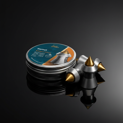 H&N Sport Hornet pallini punta dorata 4,5mm 225pz su sfondo scuro con piano a specchio