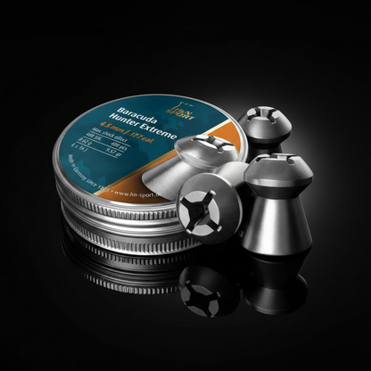 H&N Sport Baracuda Hunter Extreme piombini hollow point 4,5mm 400pz su sfondo scuro con piano a specchio