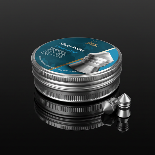 H&N Sport Silver Point piombini punta argentata 5,5mm 200pz su sfondo scuro con piano a specchio